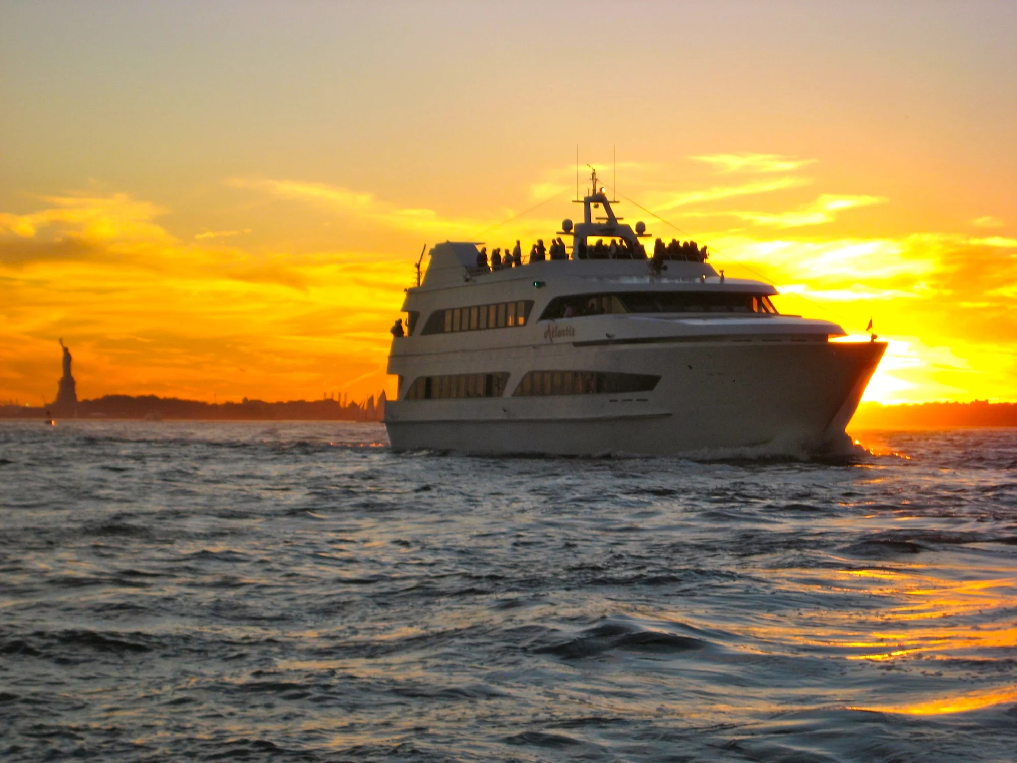 Cruise ship at sunset on Staten Island waters, Tottenville, Bronx NYC.