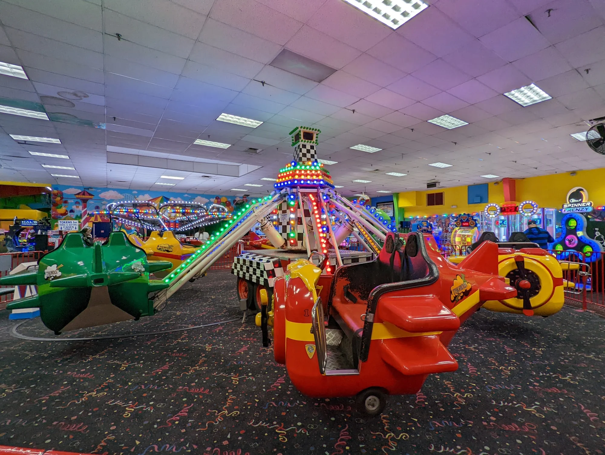 Fun Station USA featured image Indoor amusement ride with colorful lights and settings at Fun Station USA, Travis-Chelsea, Bronx NYC.