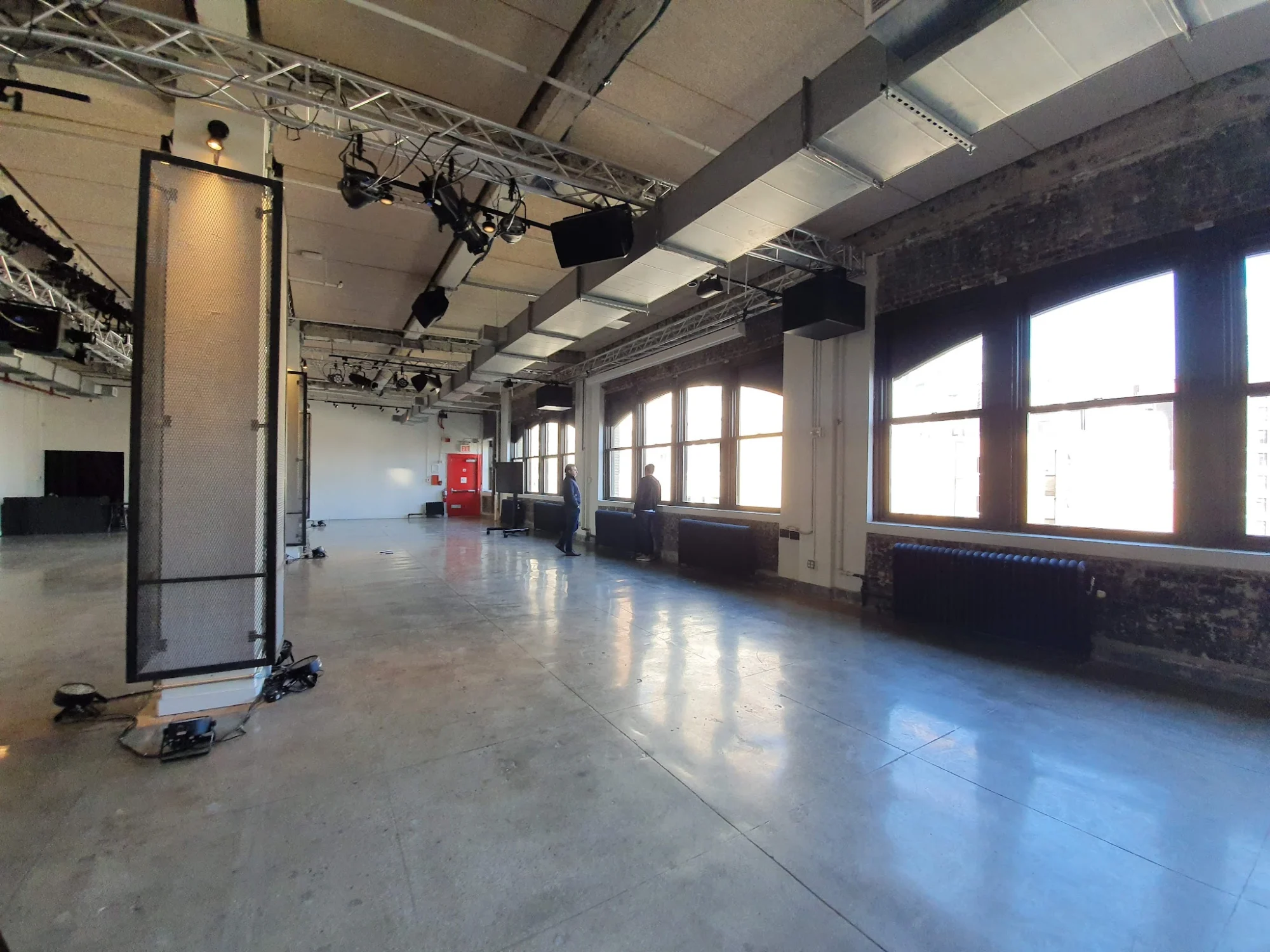 NeueHouse Madison Square featured image Spacious, well-lit room with industrial design and large windows at NeueHouse Madison Square, Flatiron District.