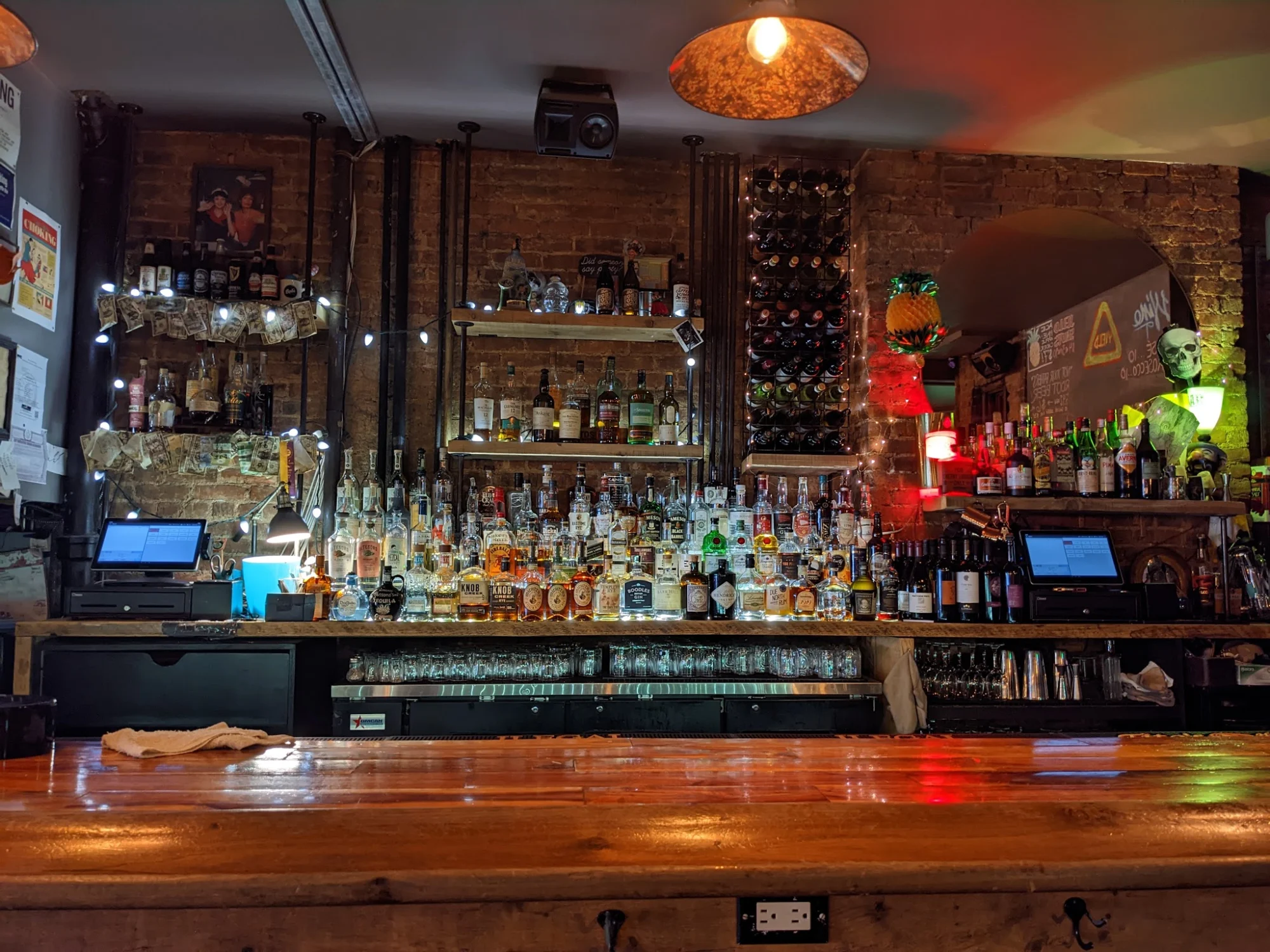 Bob's Your Uncle featured image Interior bar view with bottles on shelves at Bob's Your Uncle, Upper West Side.