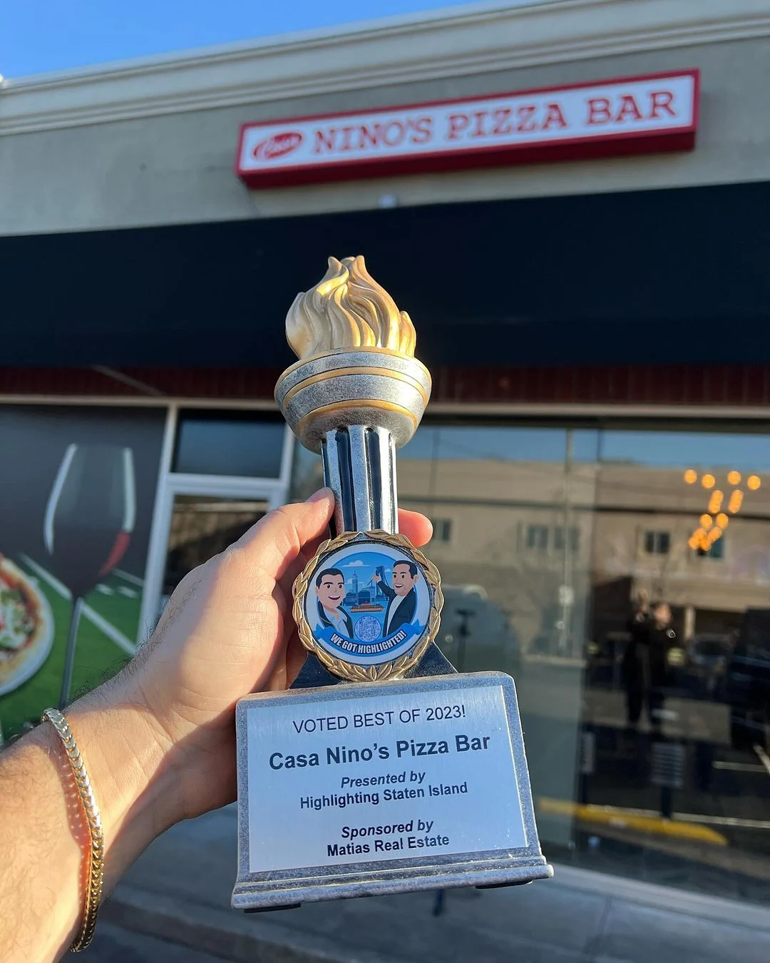 Casa Nino's Pizza Bar featured image Facade of Casa Nino's Pizza Bar with a trophy in the foreground, Arden Heights.