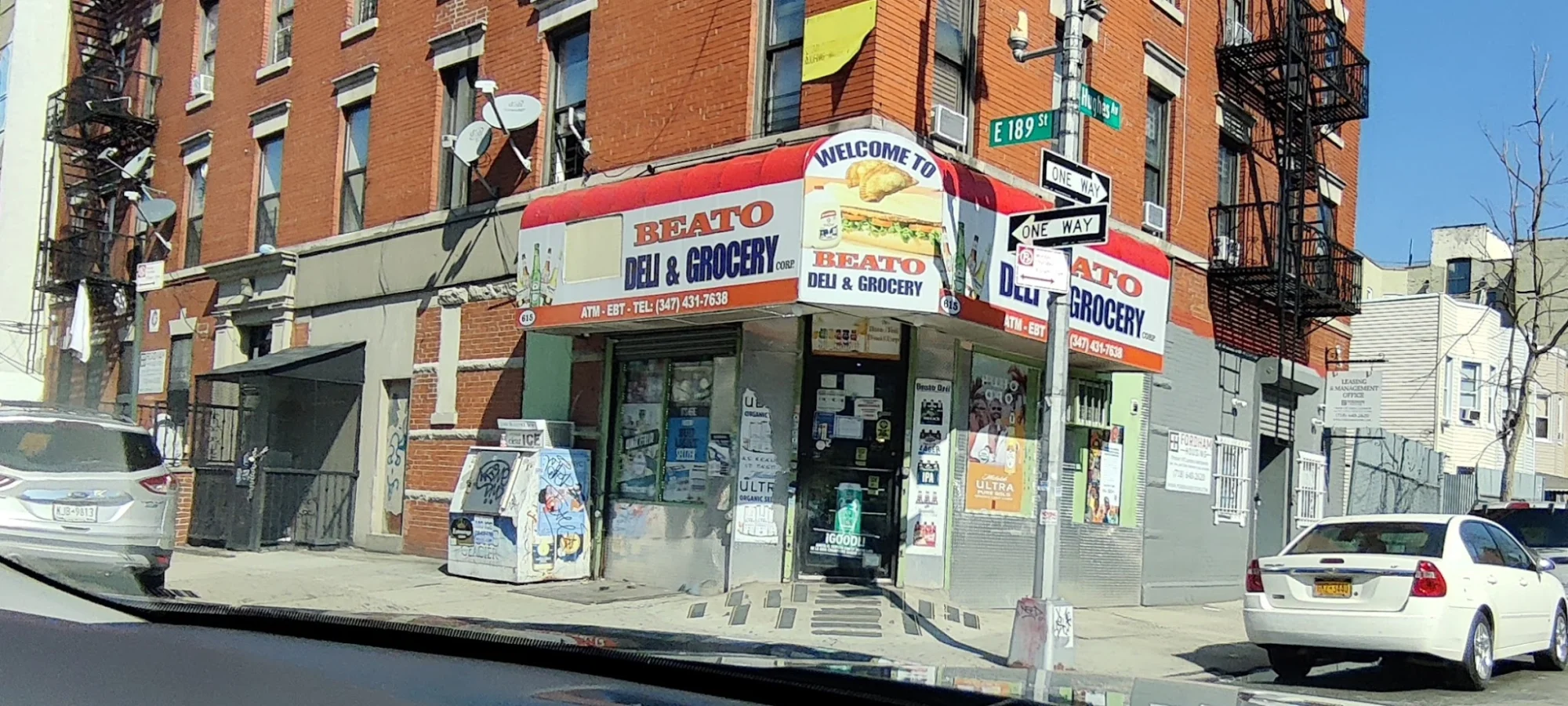 Beato Deli Food featured image Exterior of Beato Deli Food with colorful signage in Belmont, Bronx.