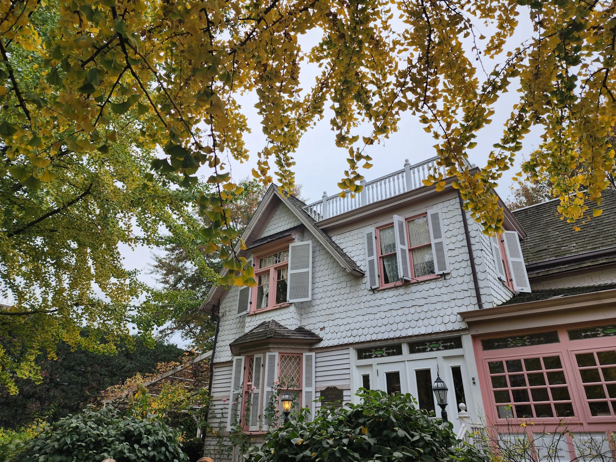 Voelker Orth Museum featured image Voelker Orth Museum house with gabled roof and fall foliage in Flushing, Bronx NYC.