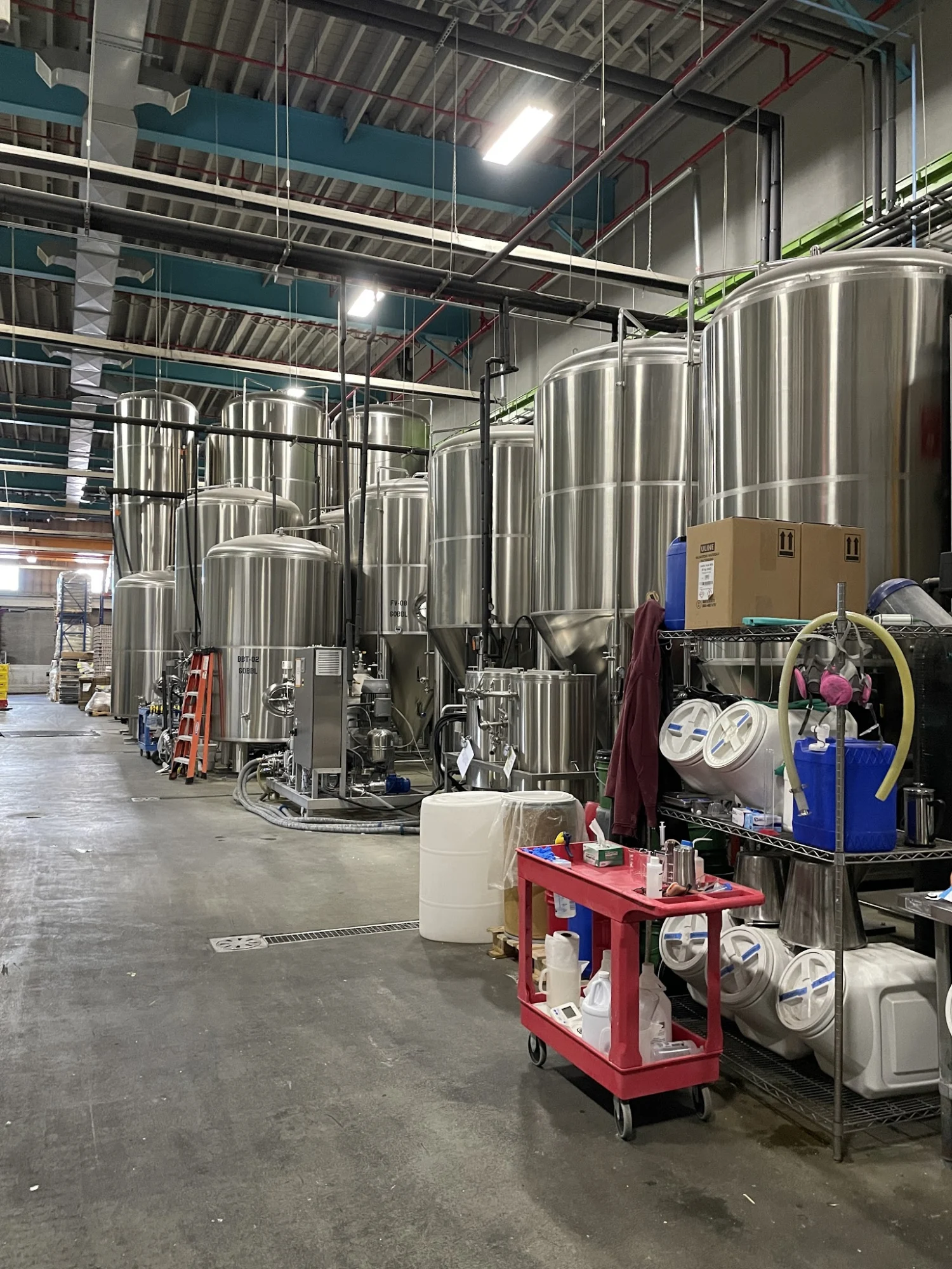 City Brew Tours NYC featured image Brewery interior with large stainless steel tanks at City Brew Tours NYC, Boerum Hill.