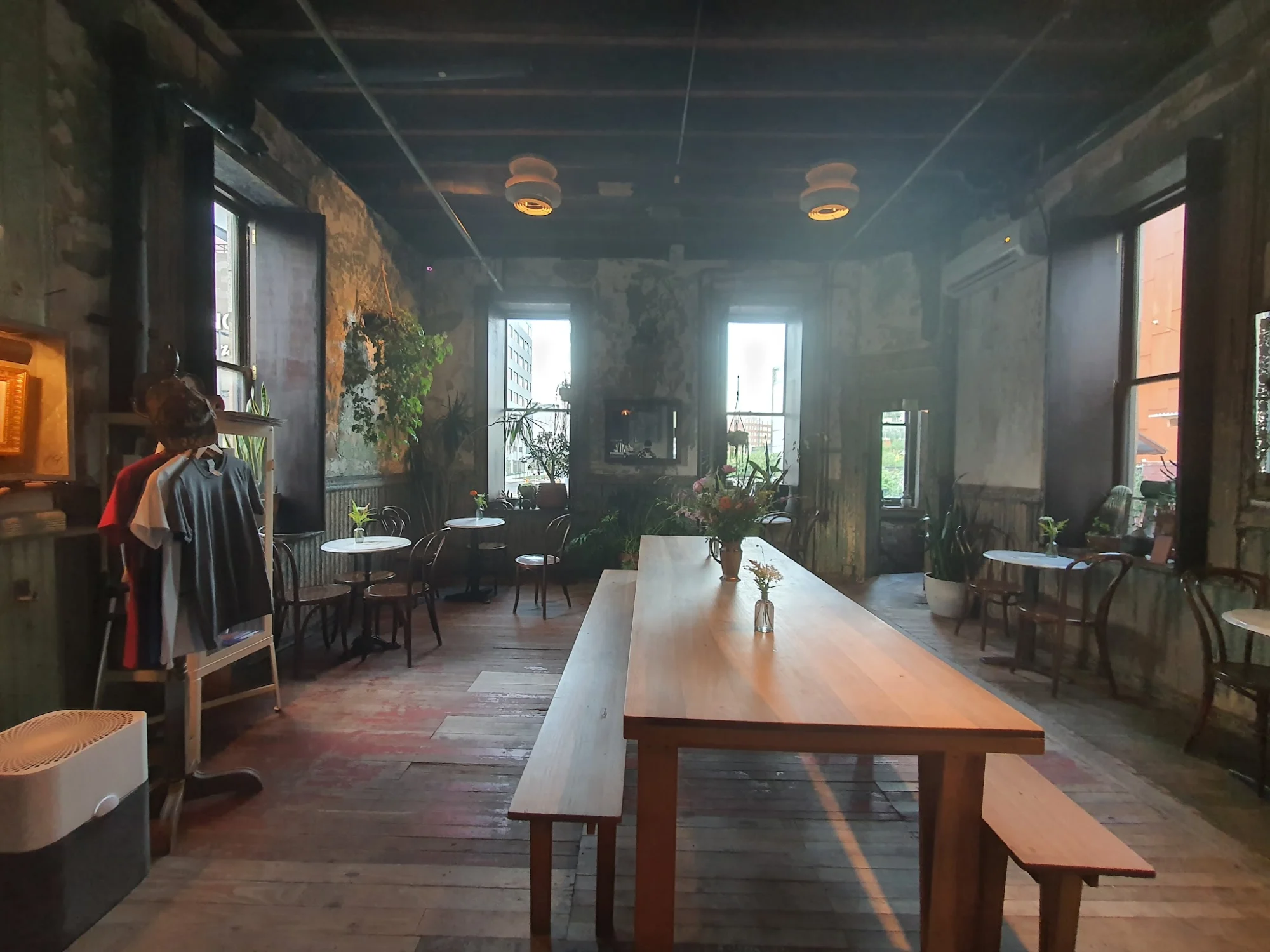Kings County Distillery featured image Interior of Kings County Distillery with rustic tables and chairs, Navy Yard, Bronx.