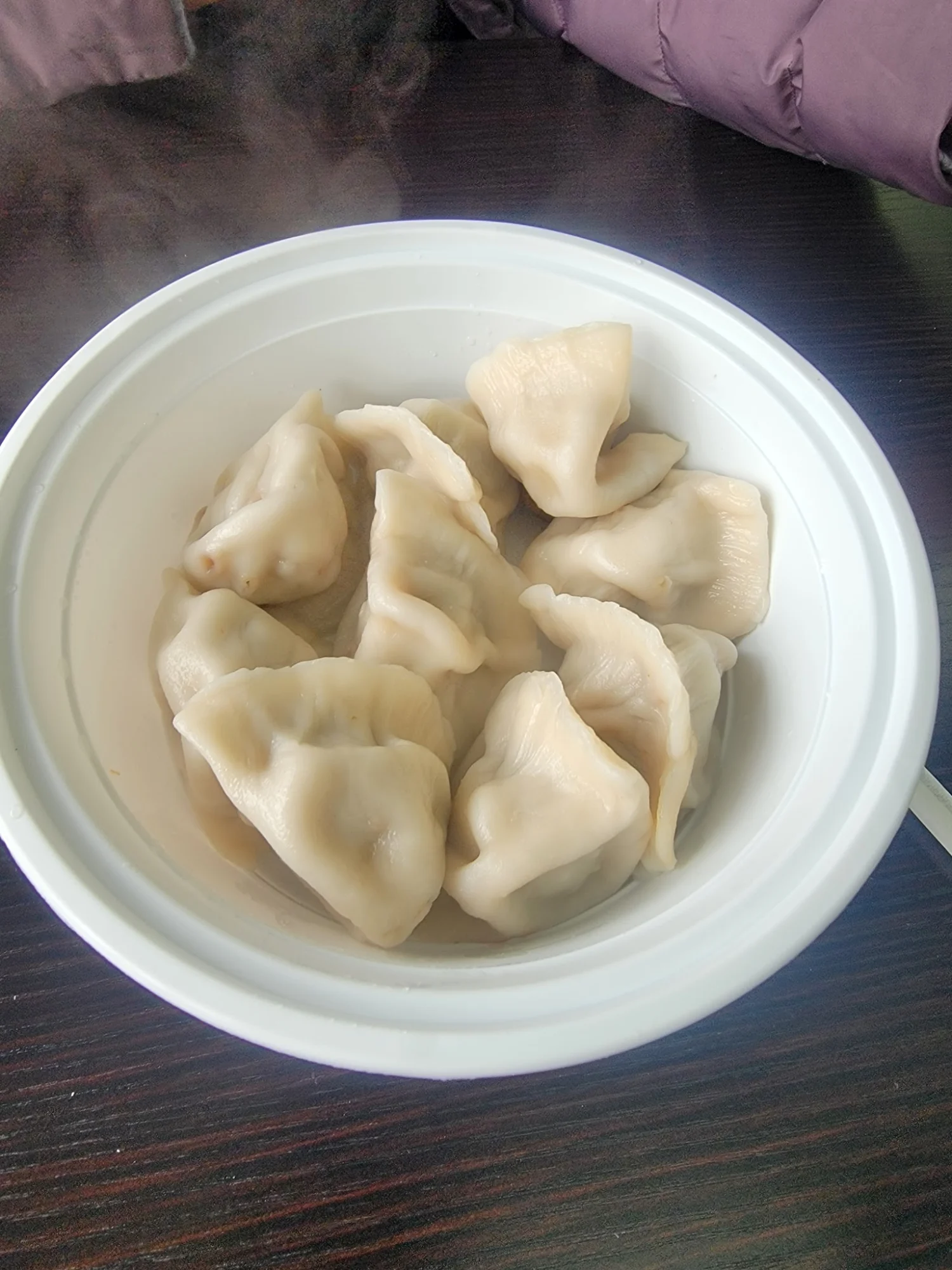 New Island featured image Plate of dumplings in a white bowl at New Island, Princes Bay.