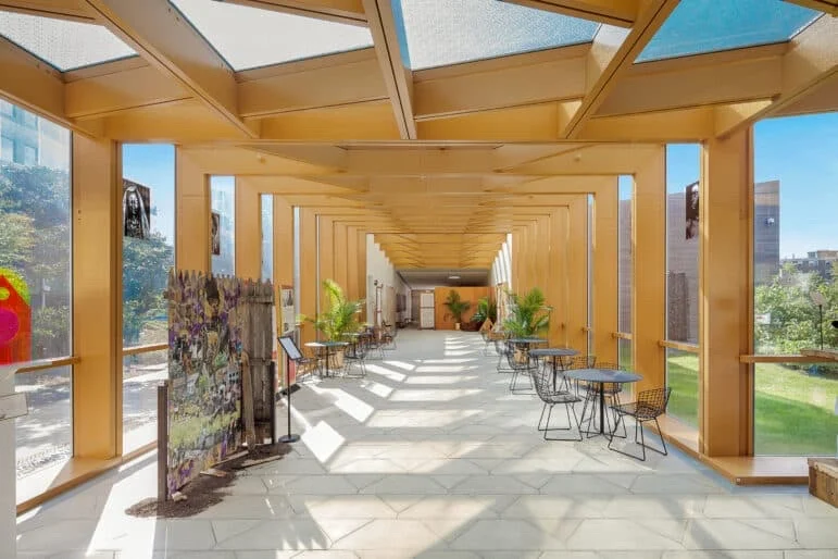 Weeksville Heritage Center featured image Interior hallway with wooden beams and skylights at Weeksville Heritage Center, Crown Heights.
