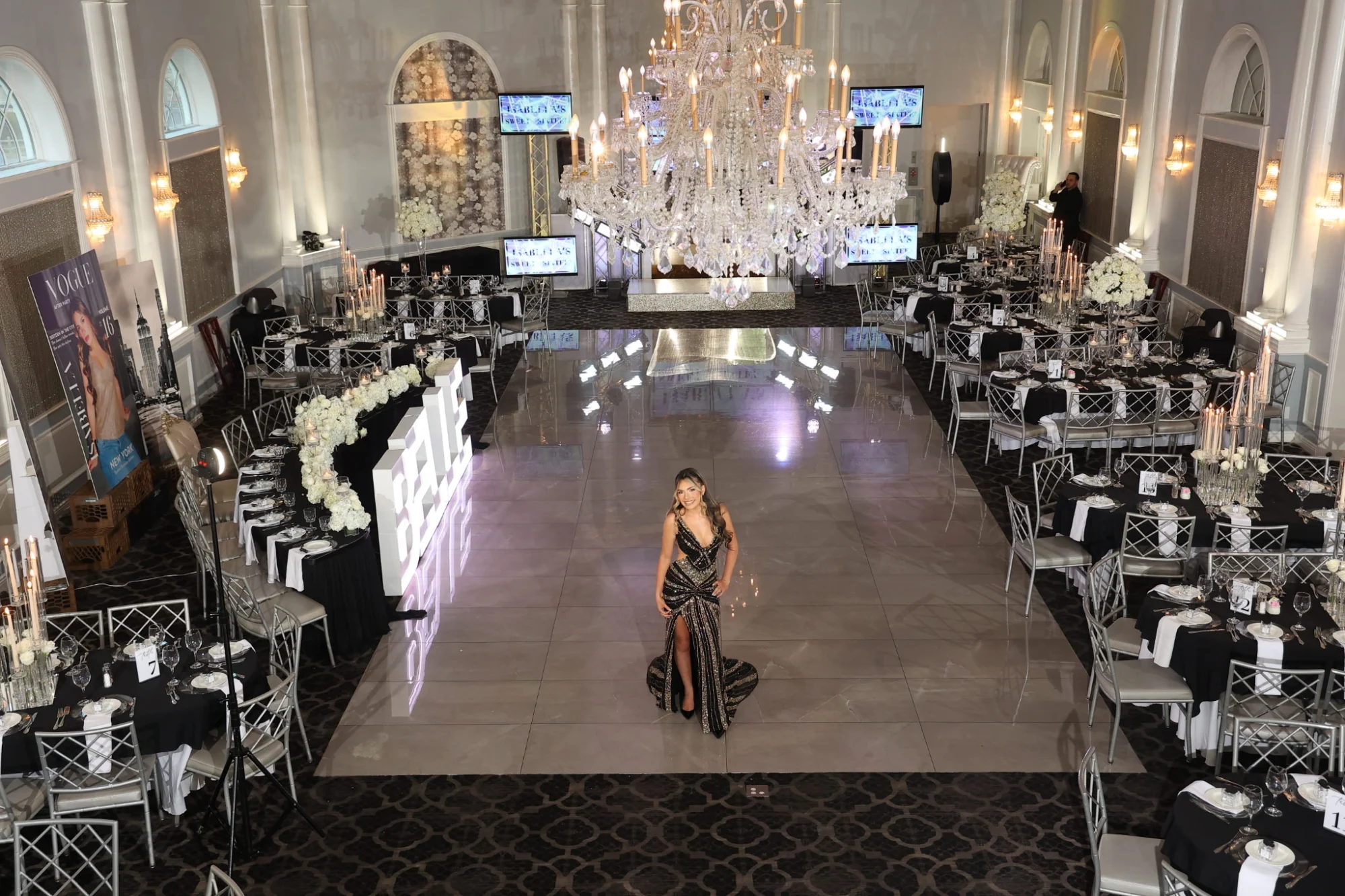 Island Chateau featured image Interior of Island Chateau, Grasmere, with elegant seating and a large chandelier.